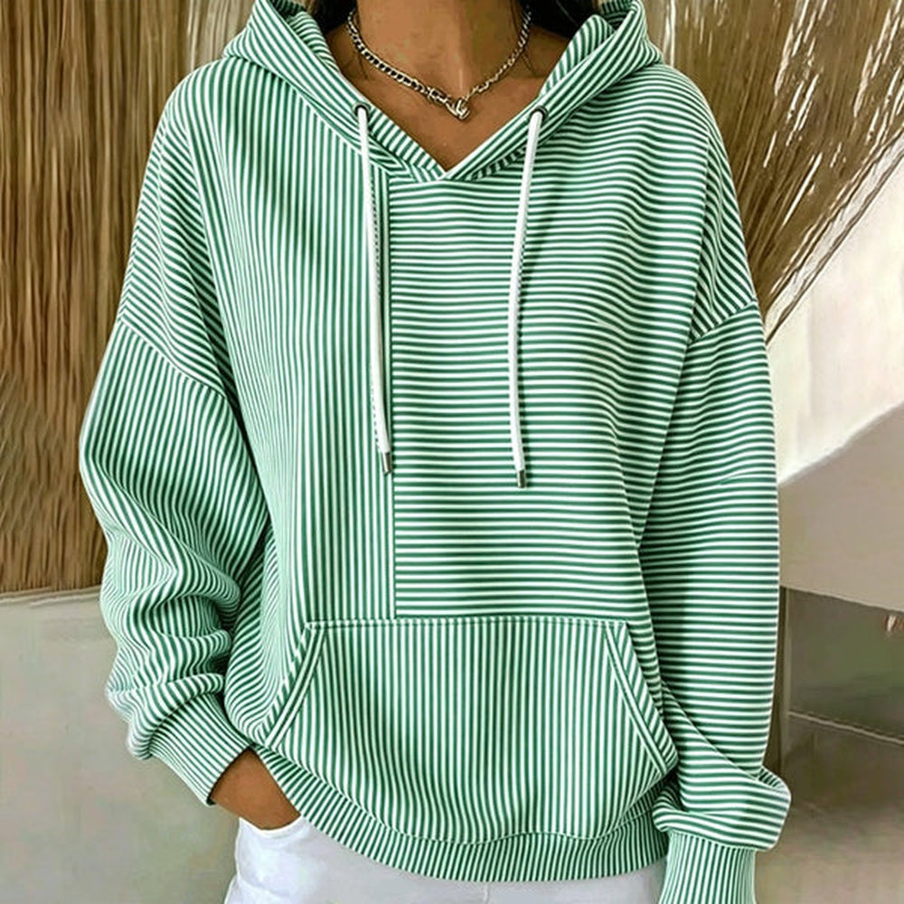 Vrouw in mintgroene gestreepte trui met witte koorden | Boutique Moda