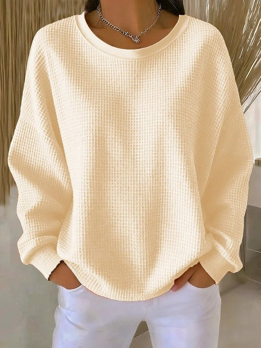 Crèmekleurige oversized sweater met wafelstructuur, voorkant