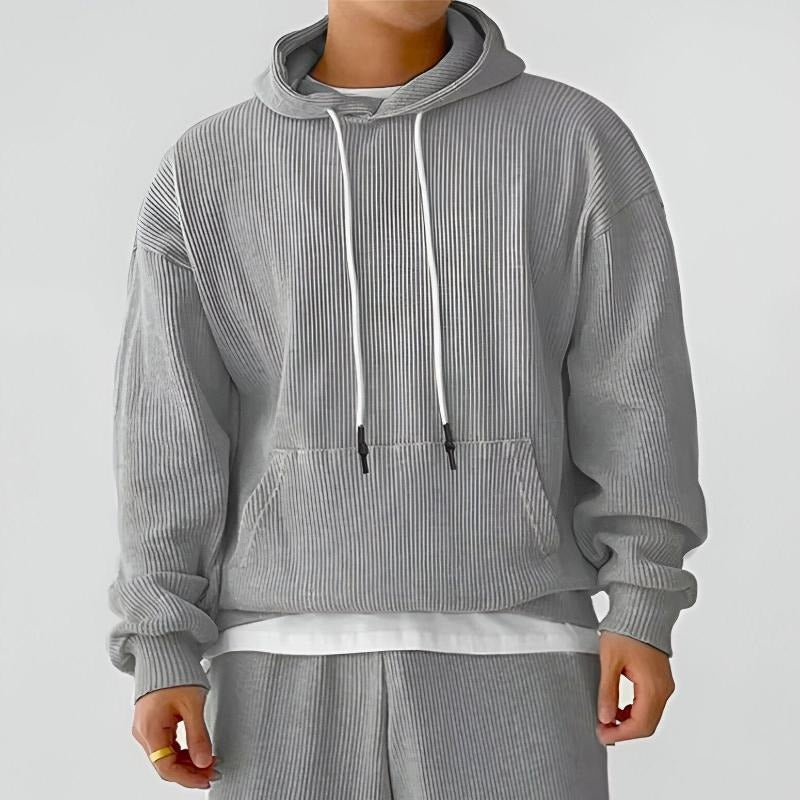 Geribde oversized hoodie voor heren in grijs, gedragen, voorkant