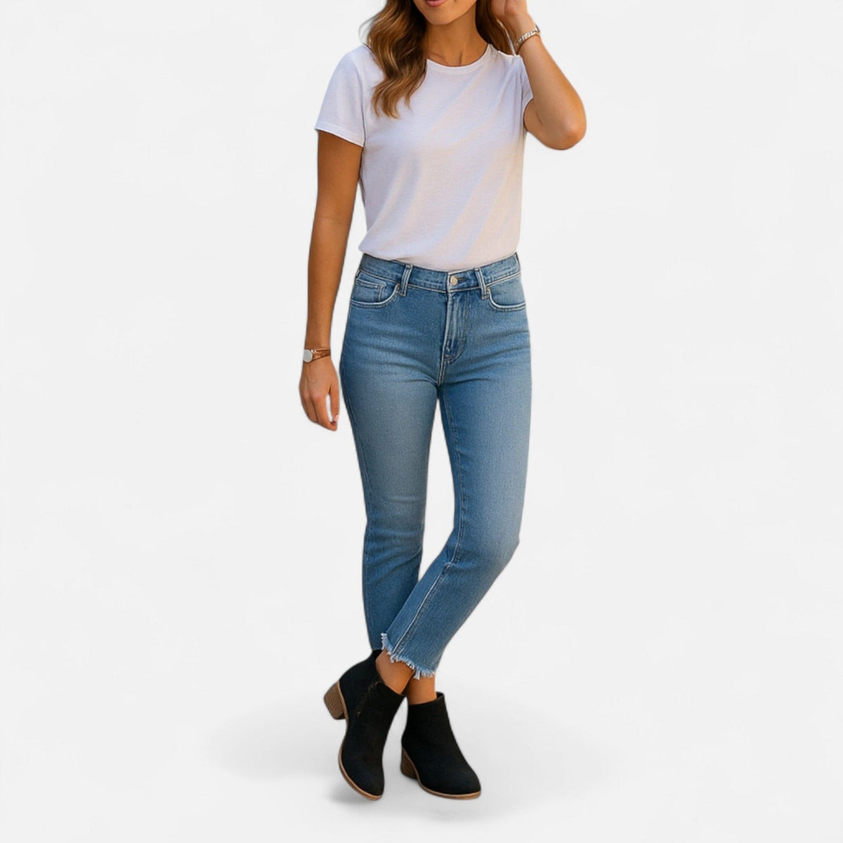 Zwarte laarsjes bij een jeans en wit T-shirt