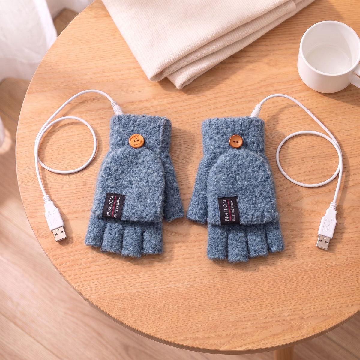 Verwarmde vingerloze handschoenen in blauw met omklapbare klep en USB-kabels