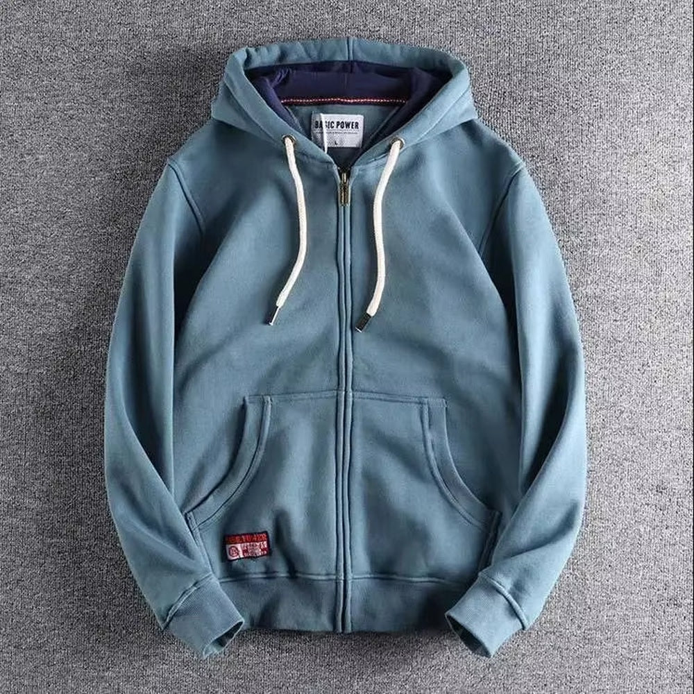 Duifblauwe hoodie met rits en gevoerde capuchon, plat neergelegd | Boutique Moda