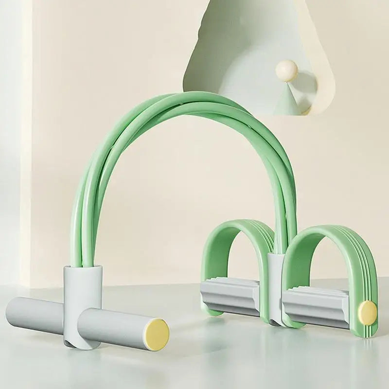 Groene weerstandsband met vier strengen en witte voetpedalen, plat liggend | Boutique Moda