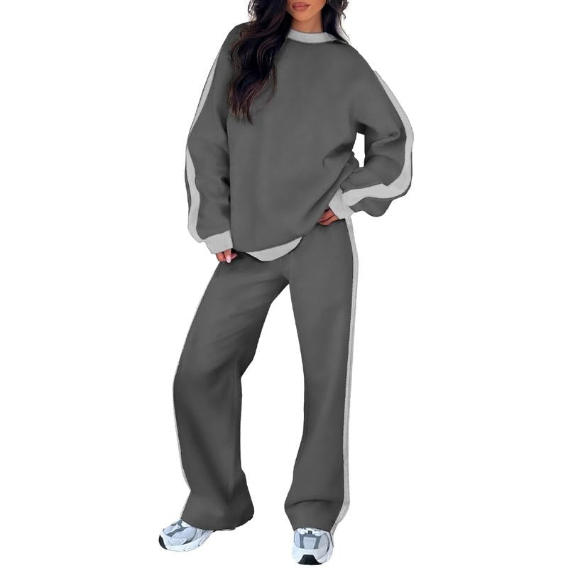 Joggingpak met zijstreep, sweater en rechte broek in donkergrijs, gedragen, vooraanzicht