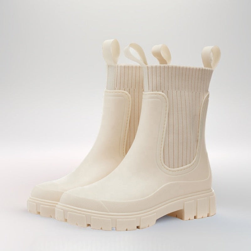 Halfhoge regenlaarzen met gebreide sokschacht in crème, productfoto