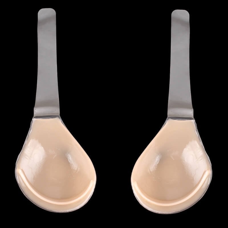 Twee huidkleurige siliconen plak bh-lepels met metalen handvat, plat liggend | Boutique Moda