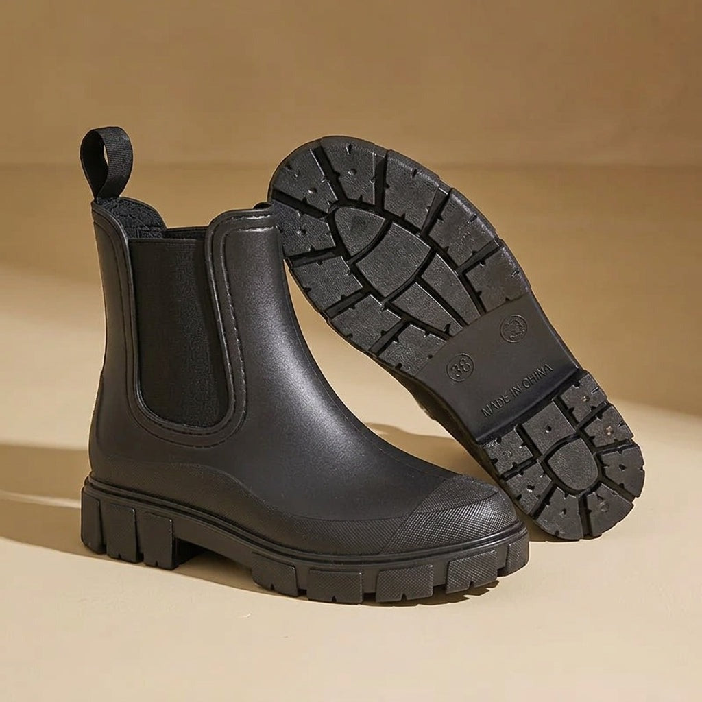 Waterdichte Chelsea boots met neuskap in zwart, close-up van de zool
