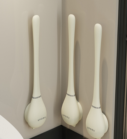 Drie crèmekleurige siliconen wc-borstels met houder, wandmontage in hoek | Boutique Moda