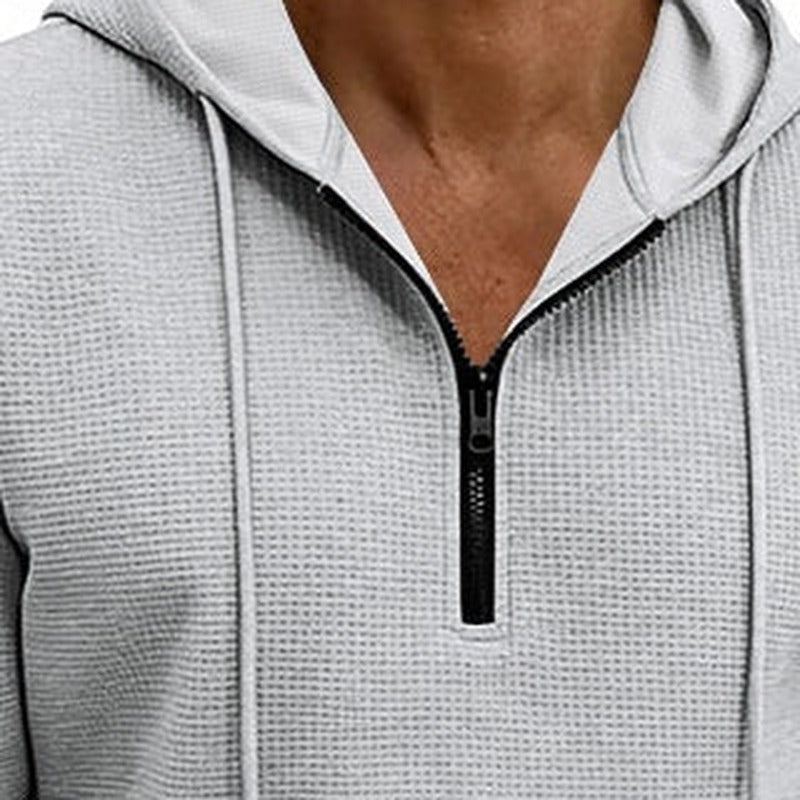 Hoodie met korte rits en wafelstructuur voor heren in lichtgrijs, close-up van de korte rits, de koorden en de wafelstructuur