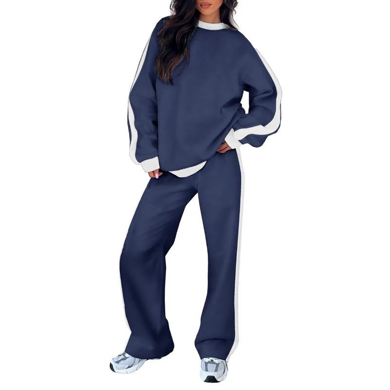 Joggingpak met zijstreep, sweater en rechte broek in marineblauw, gedragen, vooraanzicht