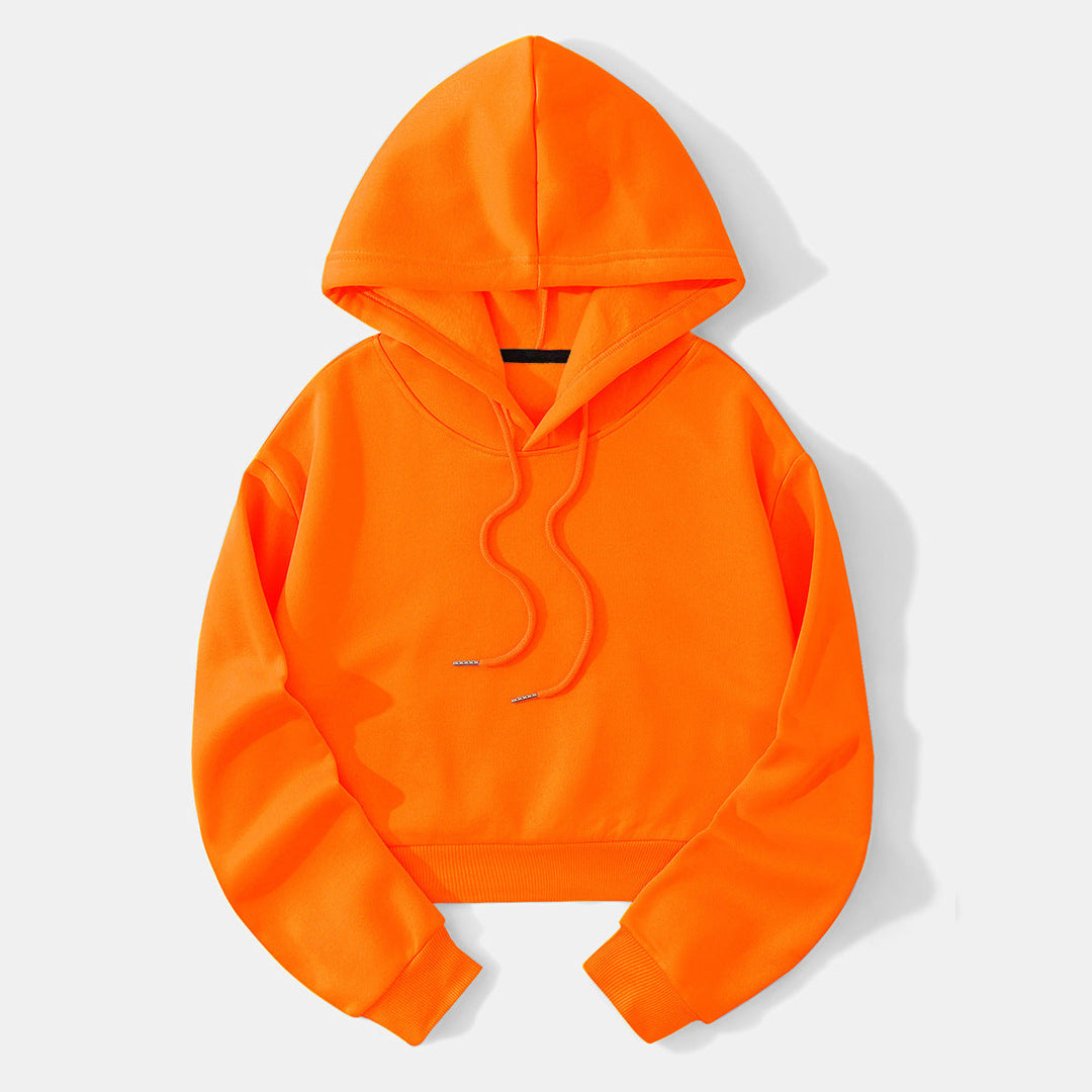 Oranje cropped hoodie plat neergelegd, met capuchon en koorden met metalen uiteinden | Boutique Moda