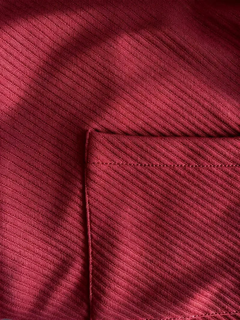 Heren blazer met gebreide structuur in bordeaux, close-up van de zak