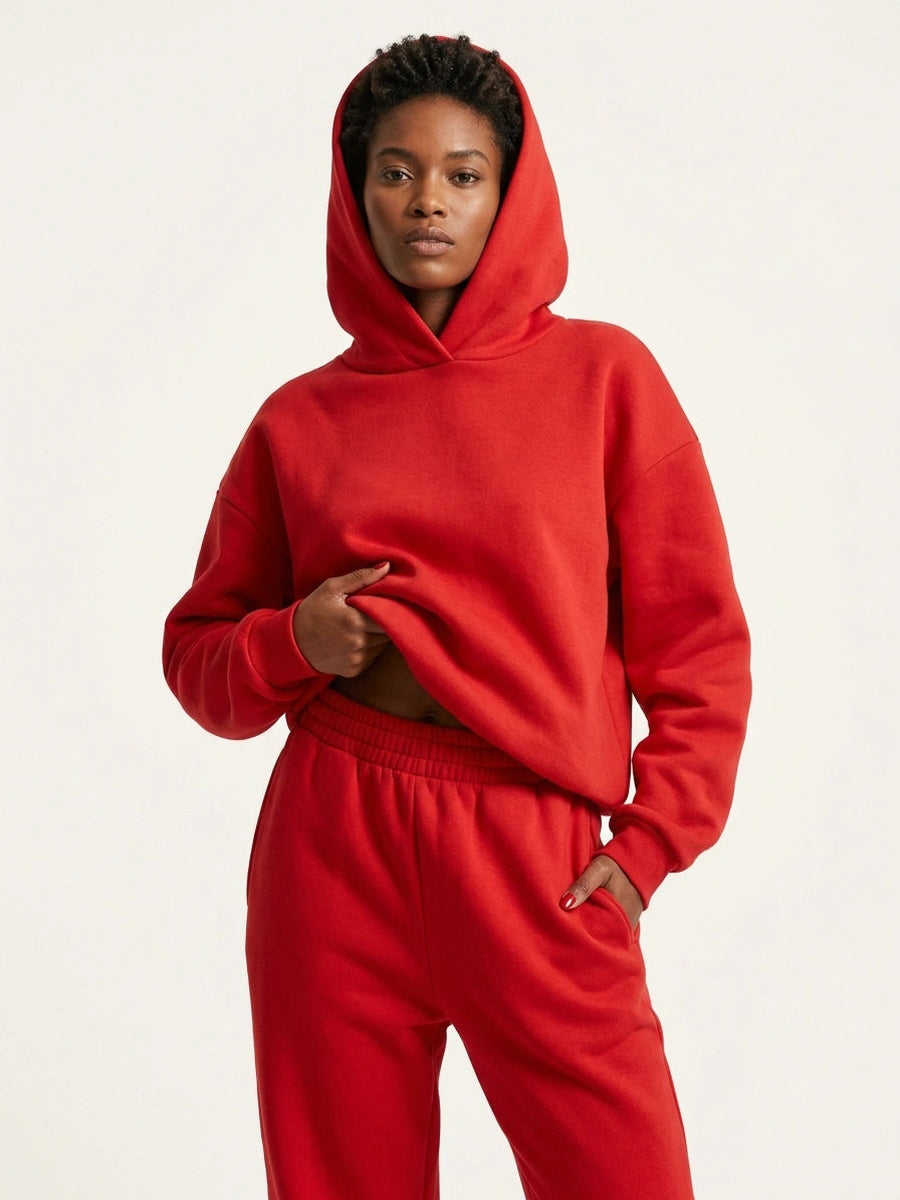 Oversized hoodie en joggingbroek in rood, capuchon op
