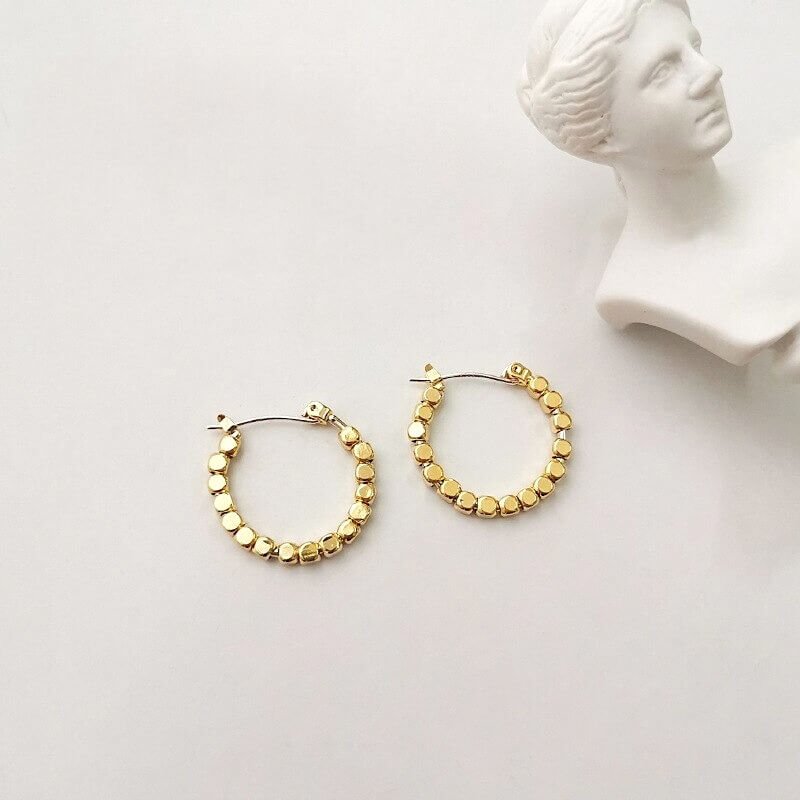 Creolen Dames | Verguld of Zilverkleurig | Kraaltjes Minimalistisch-Boutique Moda