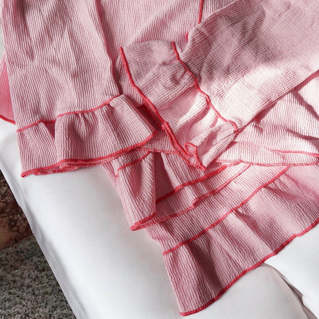 Roze pyjamaset met ruches 6