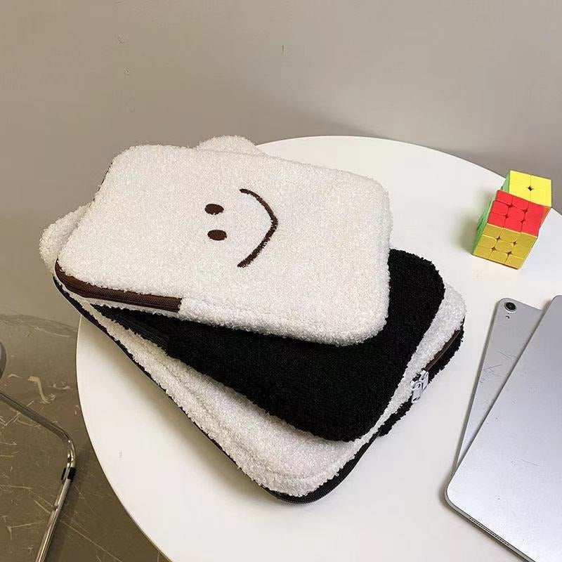 Laptophoes van teddystof met smiley 6
