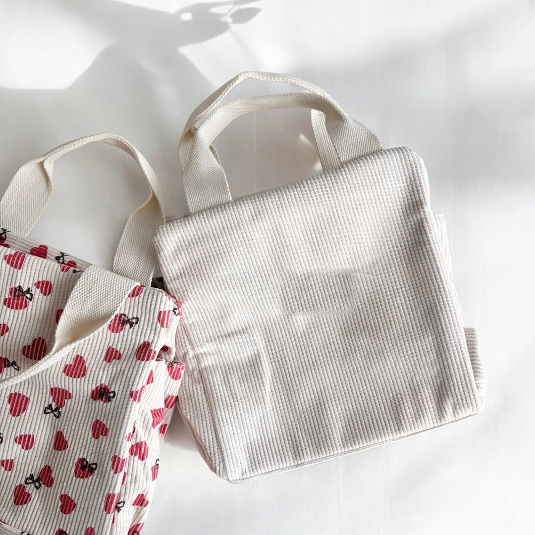 Ribfluwelen lunchtas met print 7