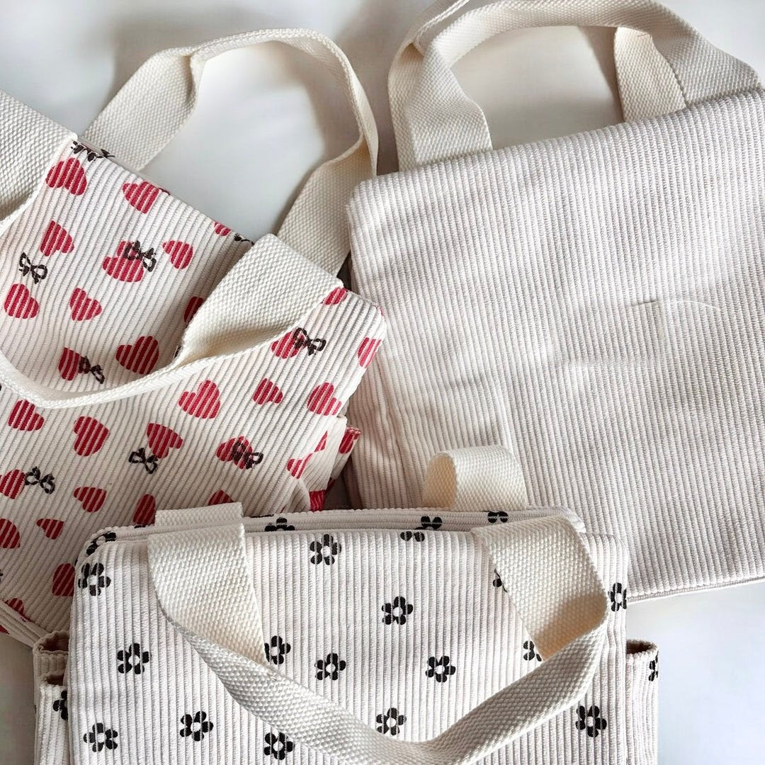 Ribfluwelen lunchtas met print 8