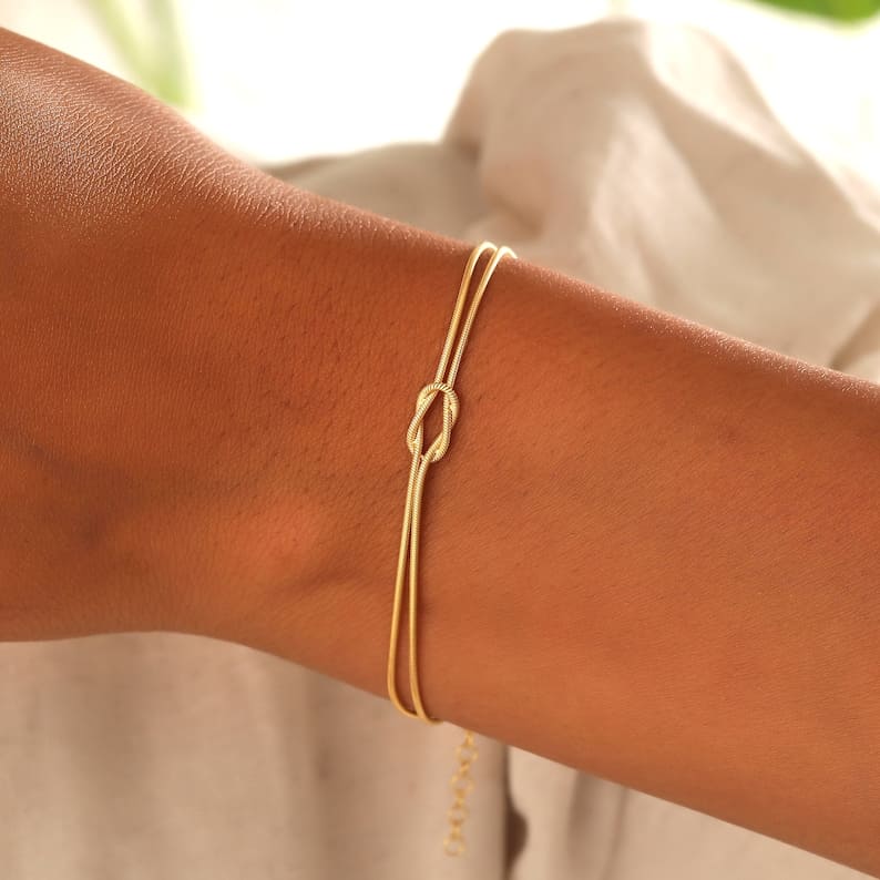Knooparmband - Minimalistische zilveren en gouden armband voor dames-Boutique Moda