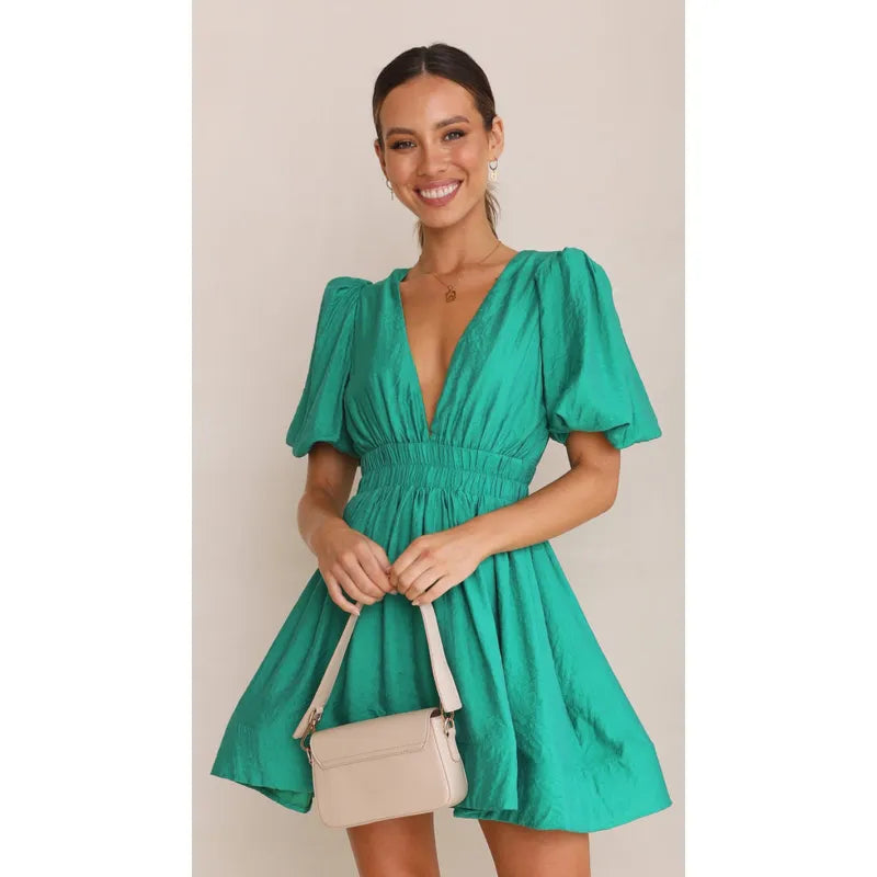 Minijurk – Jurk met pofmouwen en diepe V-hals voor de zomer-Boutique Moda