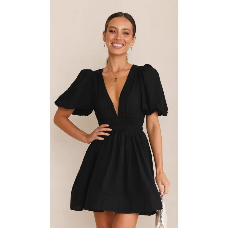 Minijurk – Jurk met pofmouwen en diepe V-hals voor de zomer-Boutique Moda