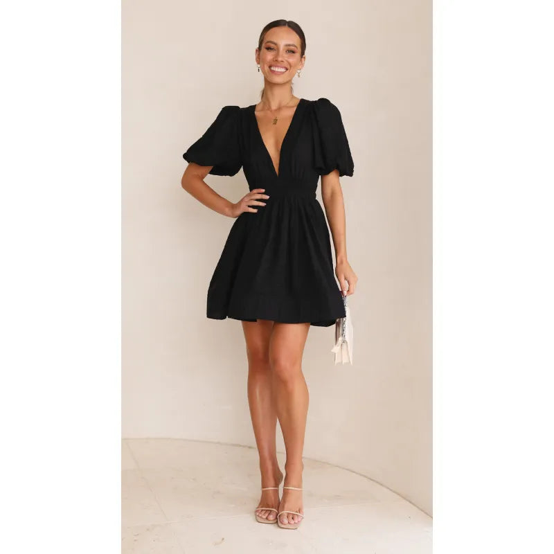 Minijurk – Jurk met pofmouwen en diepe V-hals voor de zomer-Boutique Moda