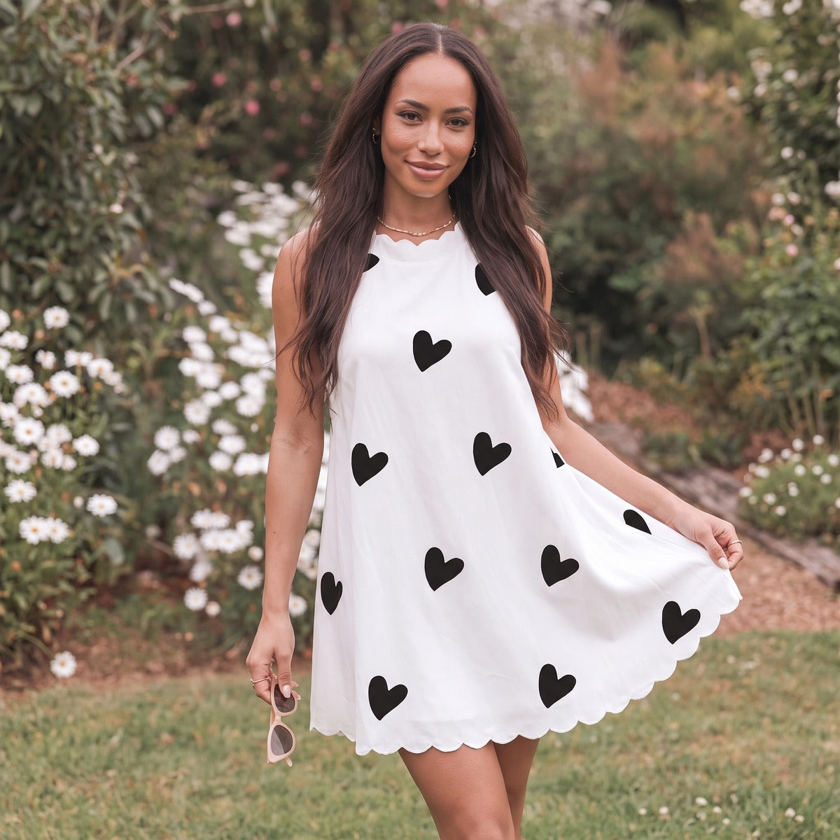 Mini-jurk mouwloos wit met zwarte hartjes - Boutique Moda