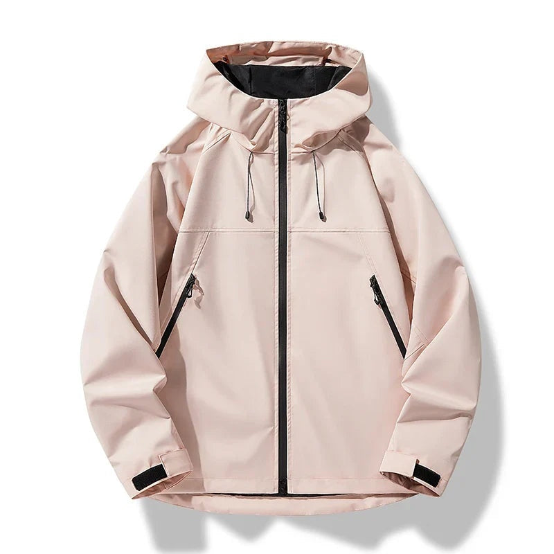 Lichtroze waterdichte jas met capuchon en ritssluiting, plat gefotografeerd | Boutique Moda