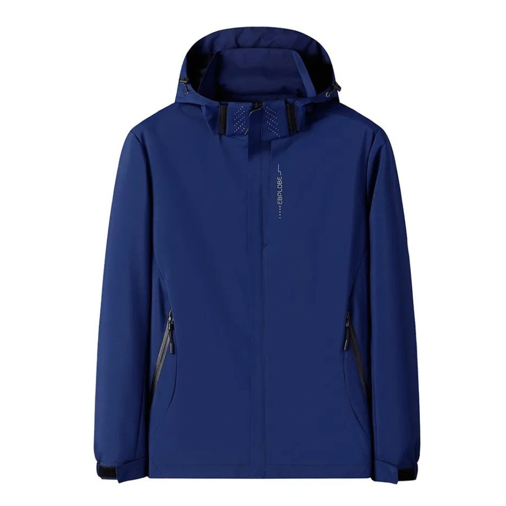 Donkerblauwe waterdichte wandeljas met capuchon, platliggend tegen witte achtergrond getoond | Boutique Moda