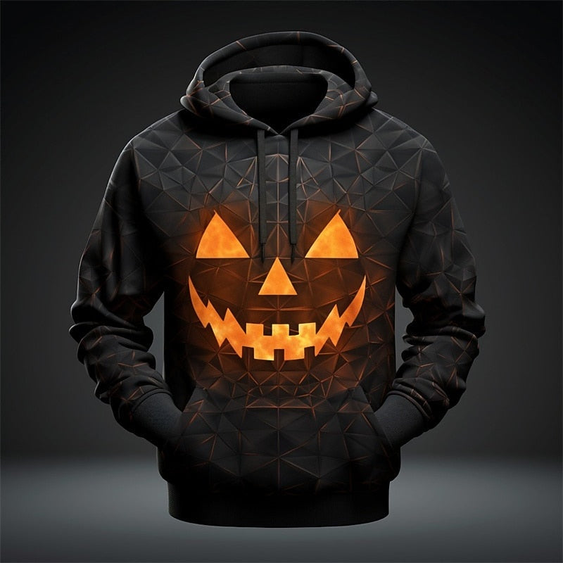 Zwarte hoodie met oranje pompoengezicht print, gedragen door een persoon | Boutique Moda