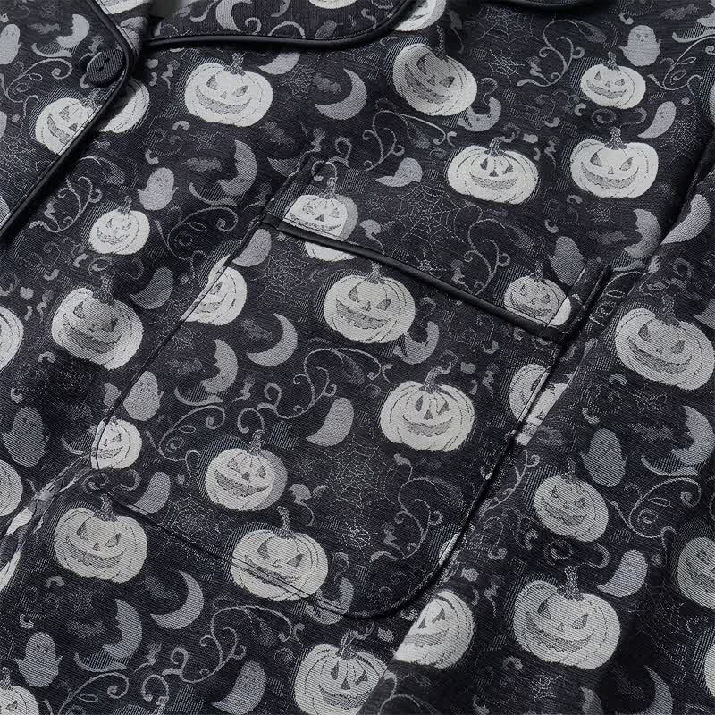 Zwarte pyjamastof met pompoenen, spoken en vleermuizen, close-up weergave | Boutique Moda