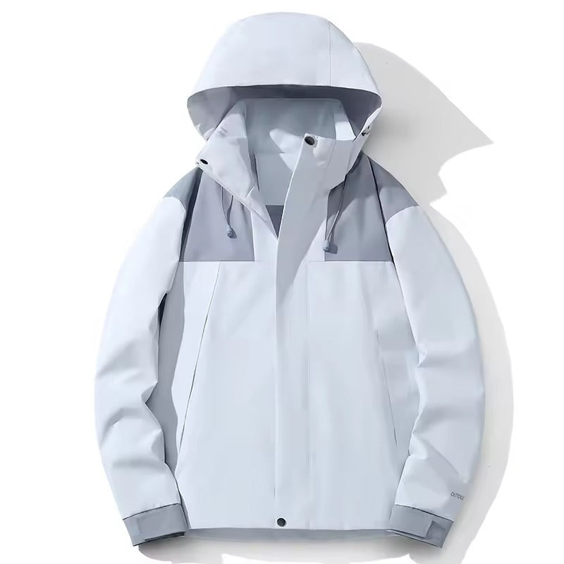 Lichtgrijs-grijze outdoorjas met capuchon, plat liggend gefotografeerd | Boutique Moda