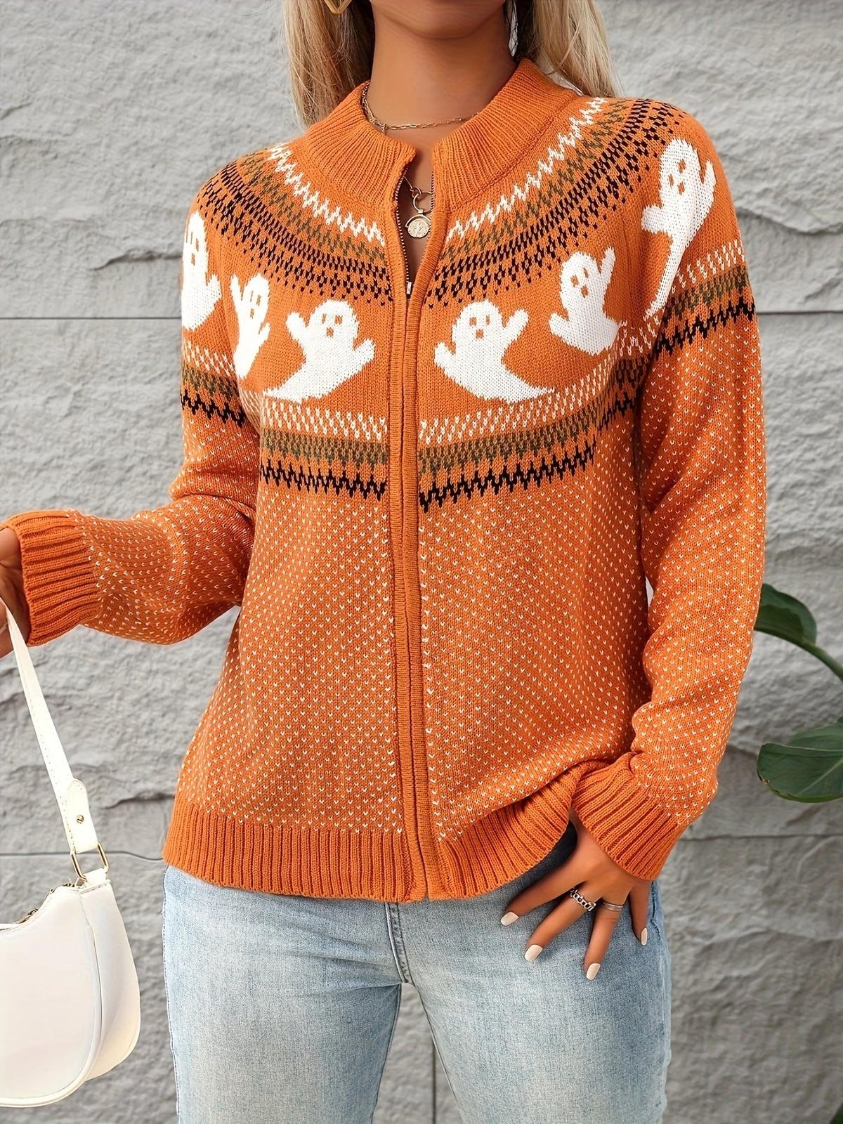 Oranje vest met rits en een witte tas