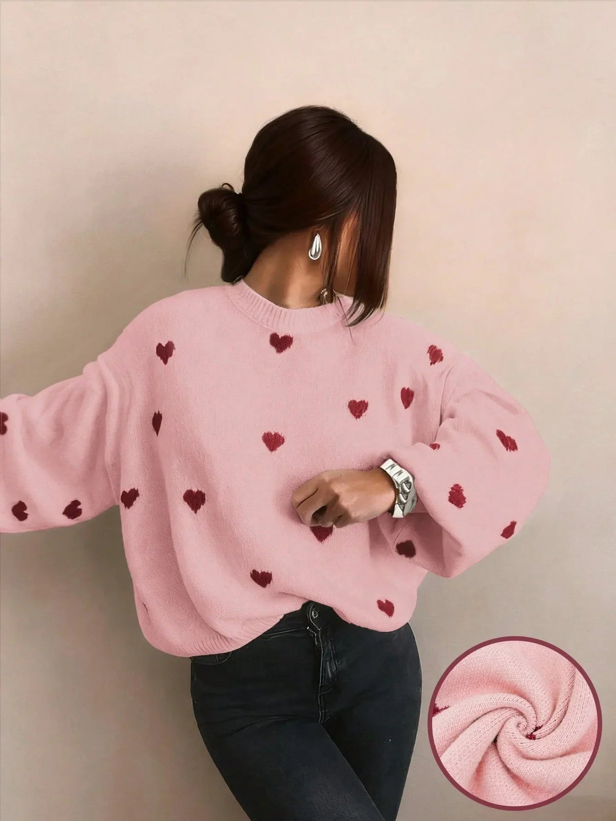 Roze oversized trui dames met donkerrode hartjes