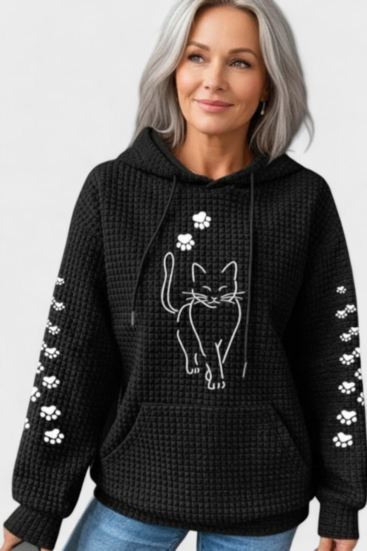 Zwarte hoodie met wafelstructuur, witte kattenprint en pootafdrukken