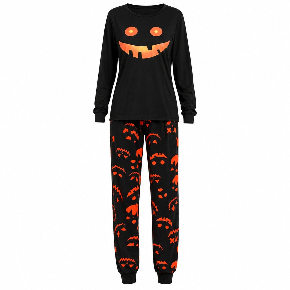 Zwarte Halloween pyjama met pompoengezicht en broek met pompoenprint