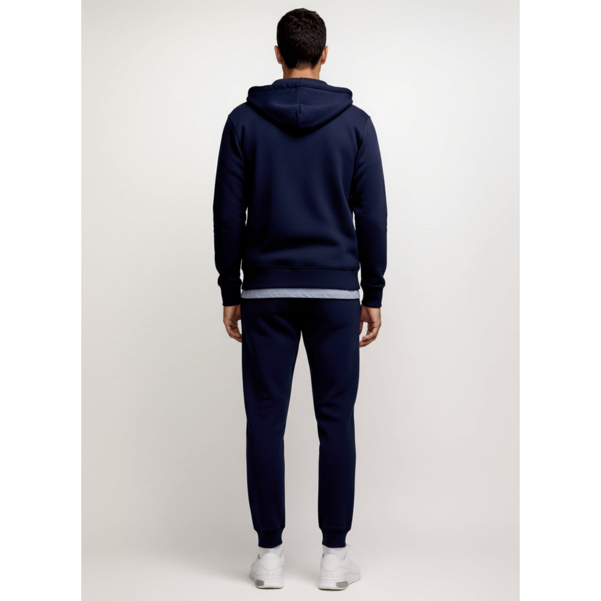 Donkerblauw trainingspak met ritshoodie, achterkant | Boutique Moda