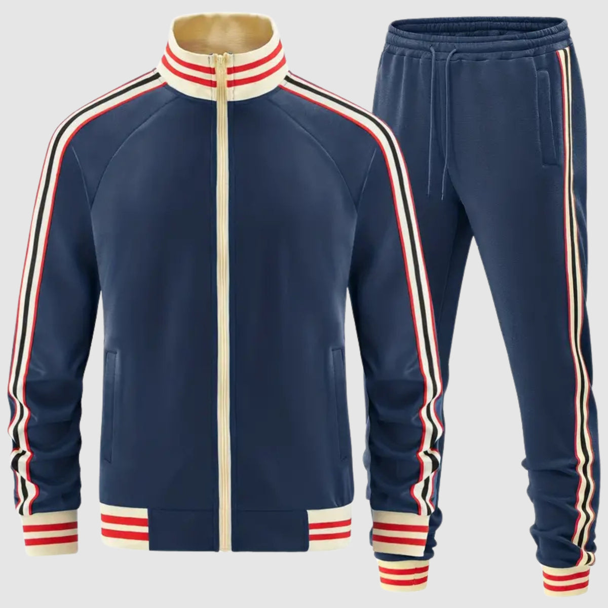 Marineblauw retro trainingsjack en broek met crèmekleurige, rode en zwarte contraststrepen | Boutique Moda