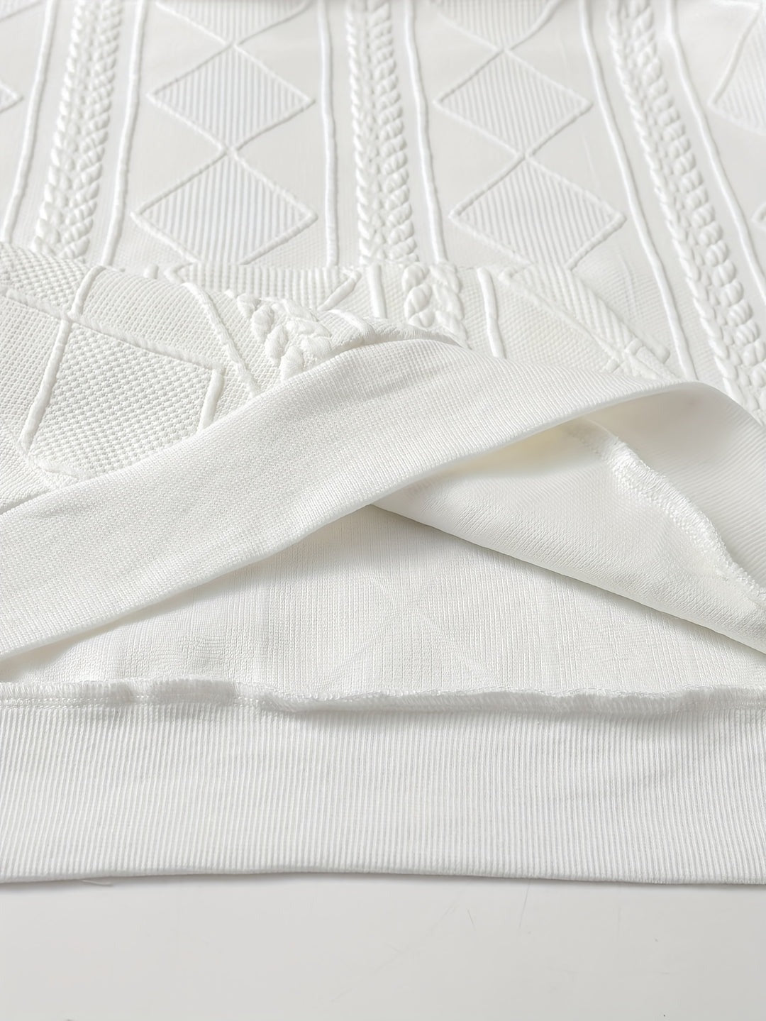 Close-up van de geribde zoom en de gladde binnenkant van de stof | Boutique Moda