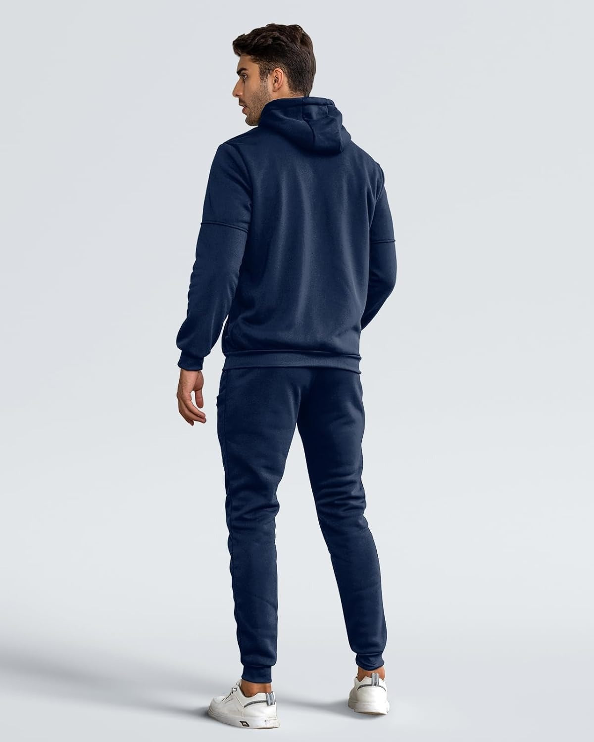 Marineblauw trainingspak met ritshoodie, achterkant | Boutique Moda