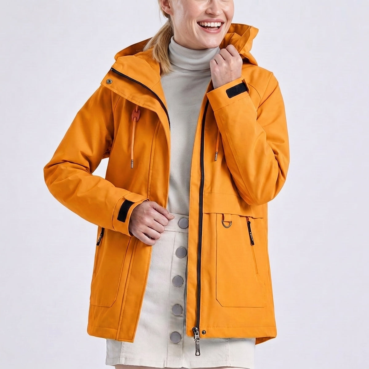 Oranje regenjas met capuchon, tweewegrits en ritszakken | Boutique Moda