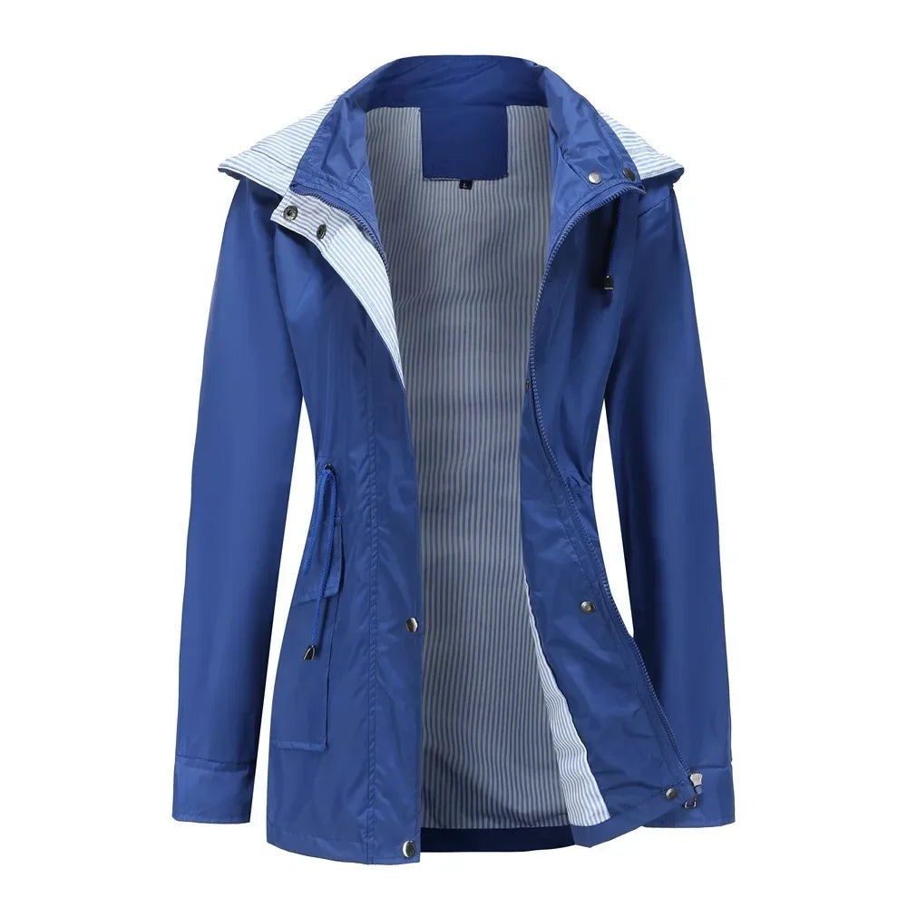 Gevoerde regenjas in blauw met capuchon | Boutique Moda