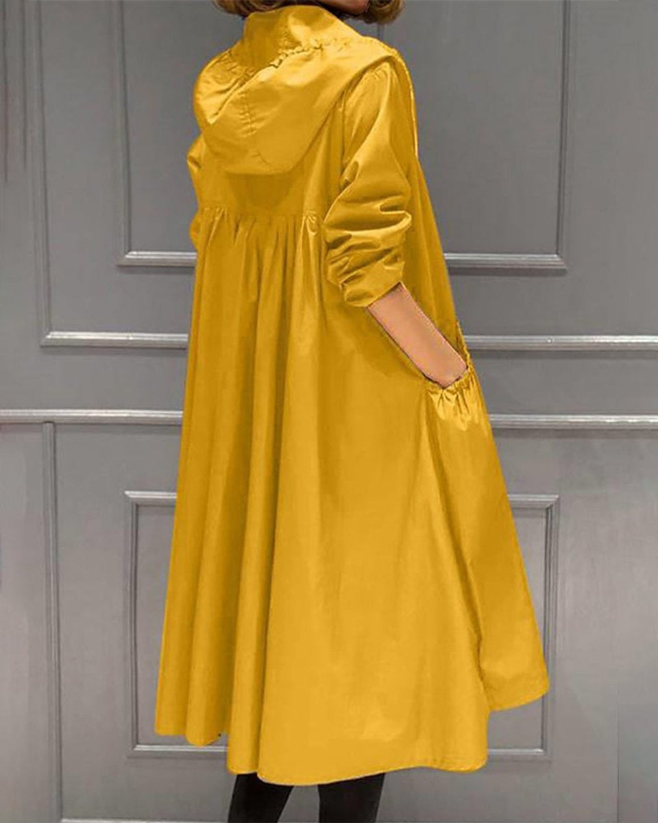 Achterkant van de gele regenjas met gerimpelde taille | Boutique Moda