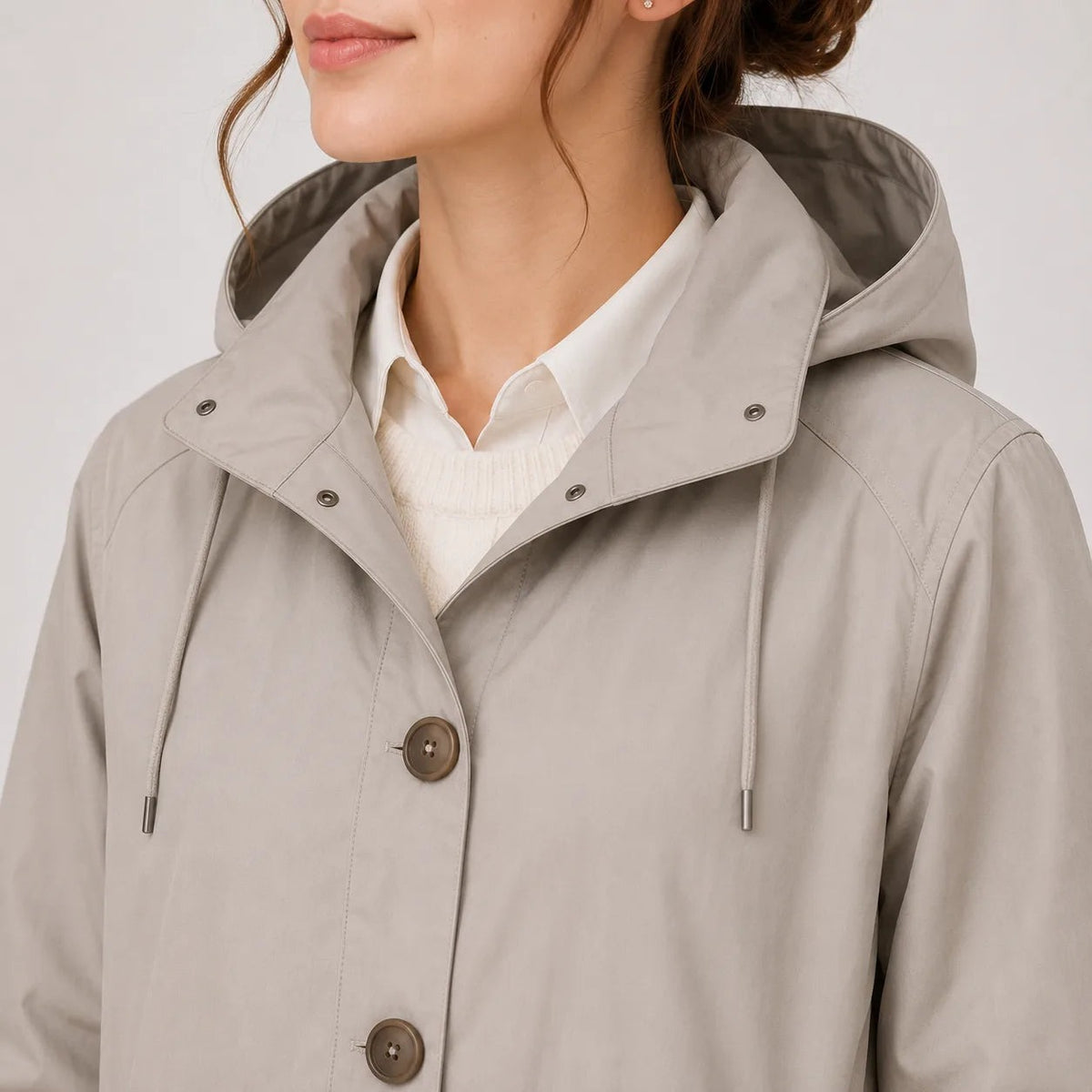 Close-up van de capuchon en de knopen | Boutique Moda