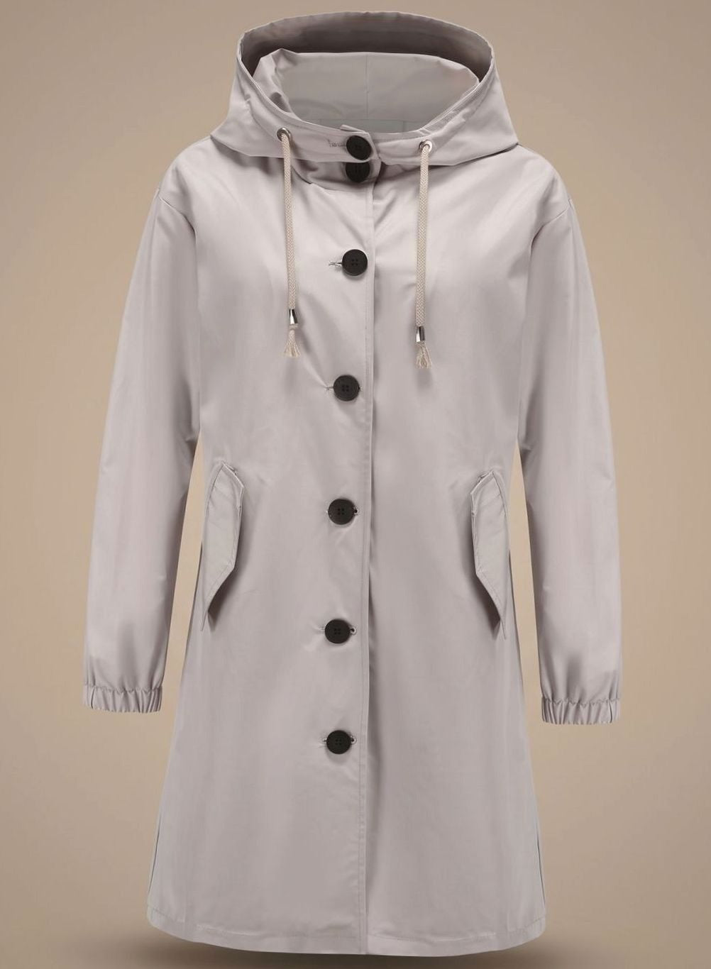 Lange trenchcoat in grijs met capuchon en knoopsluiting | Boutique Moda