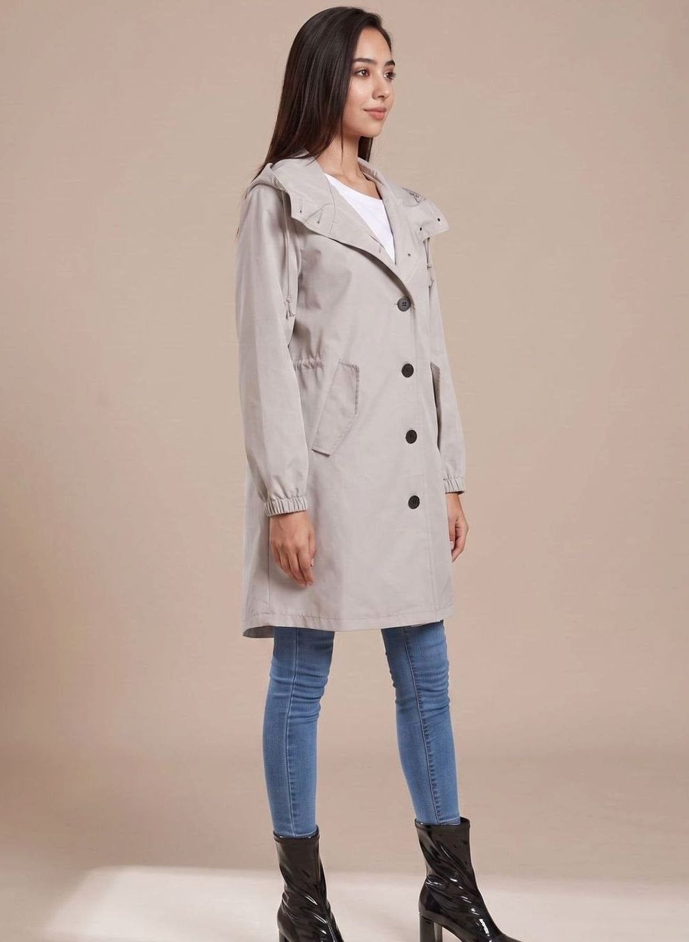 Grijze trenchcoat met capuchon, zijkant | Boutique Moda