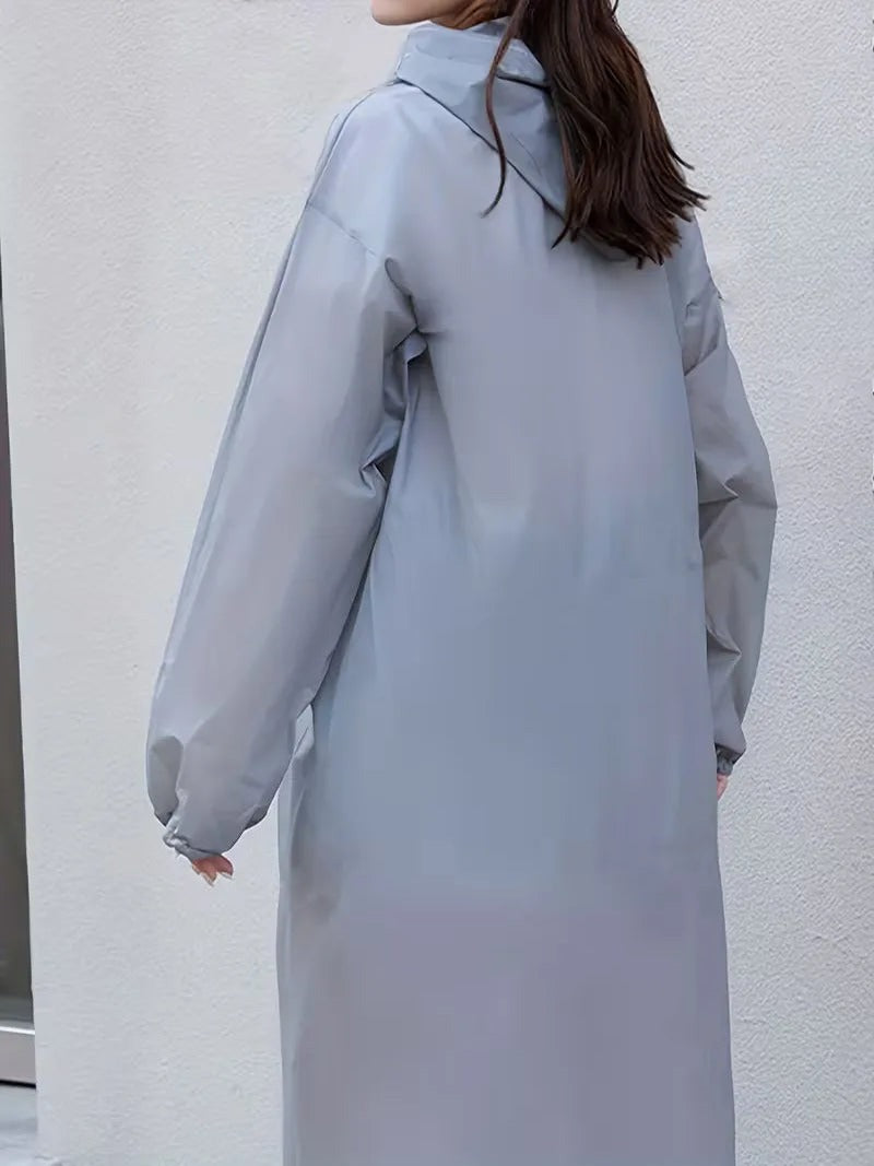 Achterkant van de grijze regenjas | Boutique Moda