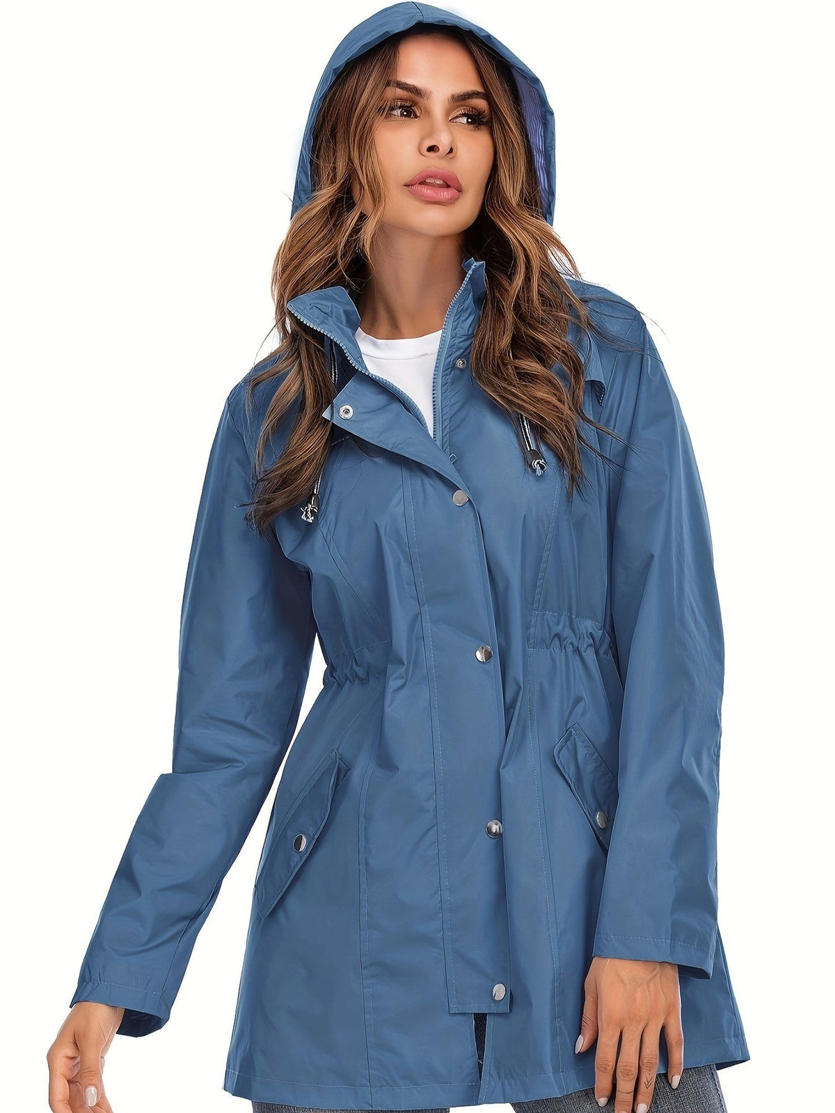 Regenjas in jeansblauw met de capuchon op | Boutique Moda