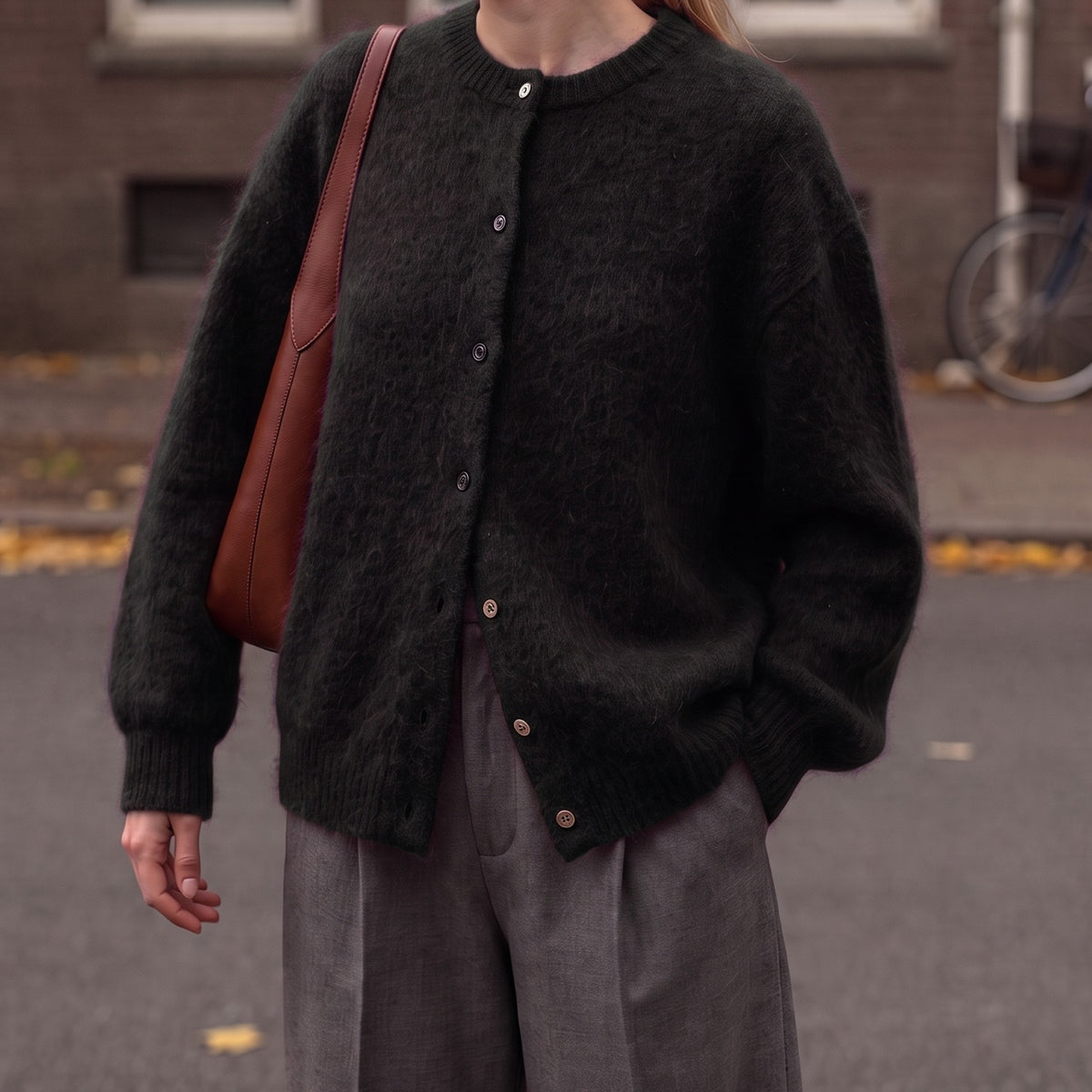 Fluffy oversized vest in zwart met knoopsluiting | Boutique Moda