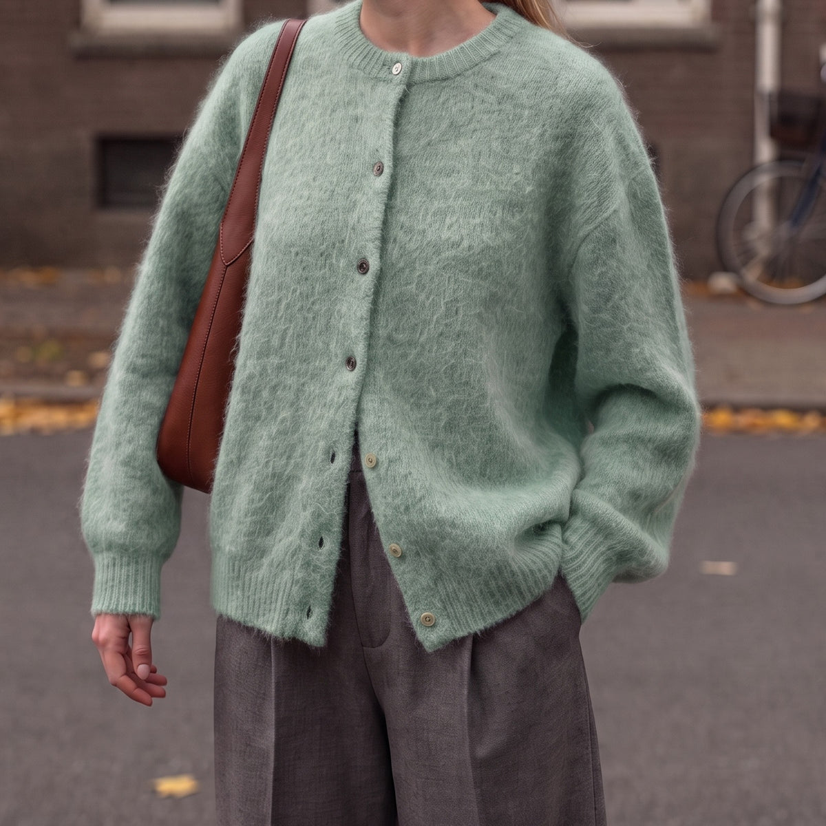 Fluffy oversized vest in mintgroen met knoopsluiting | Boutique Moda